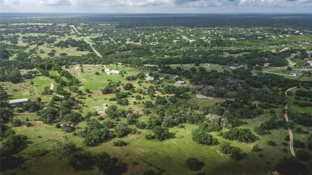 a view of a yard with a house