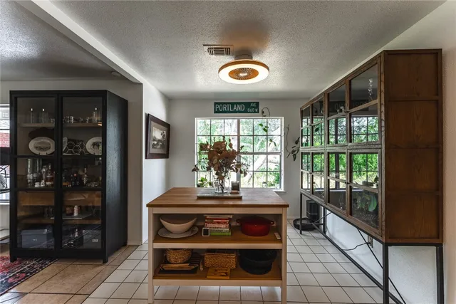 a room with fireplace and furniture