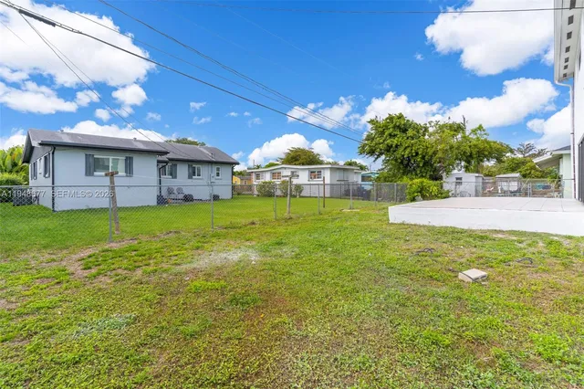a view of a house with a big yard