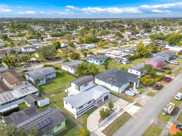 a view of swimming pool from a living room