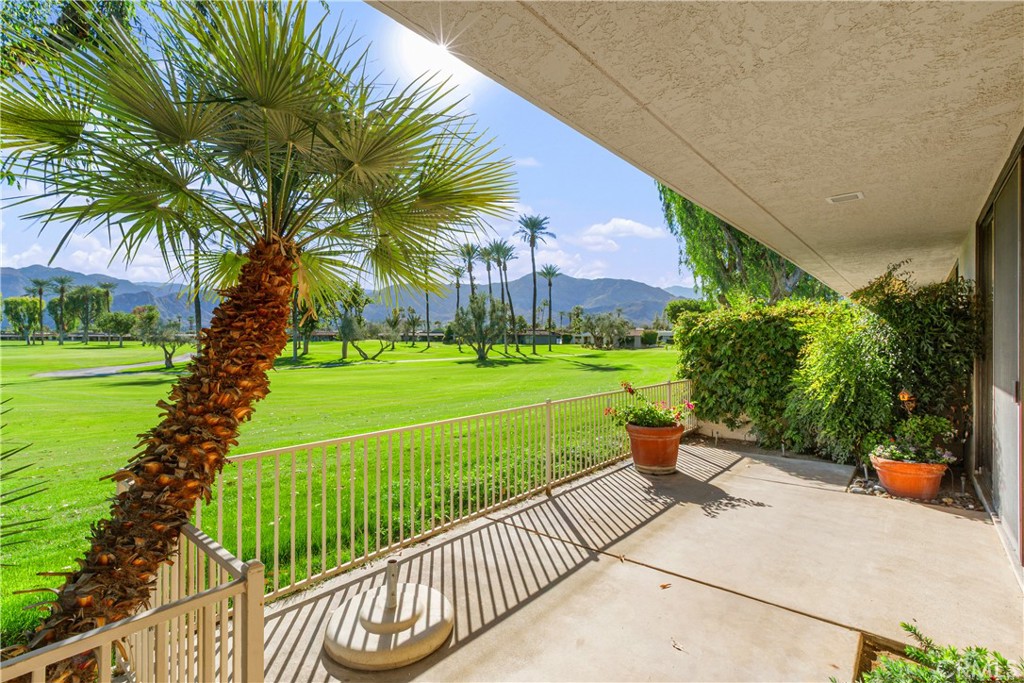 5 Princeton Drive Rancho Mirage, CA 92270 - Photo 21 of 27 a view of a garden with a slide