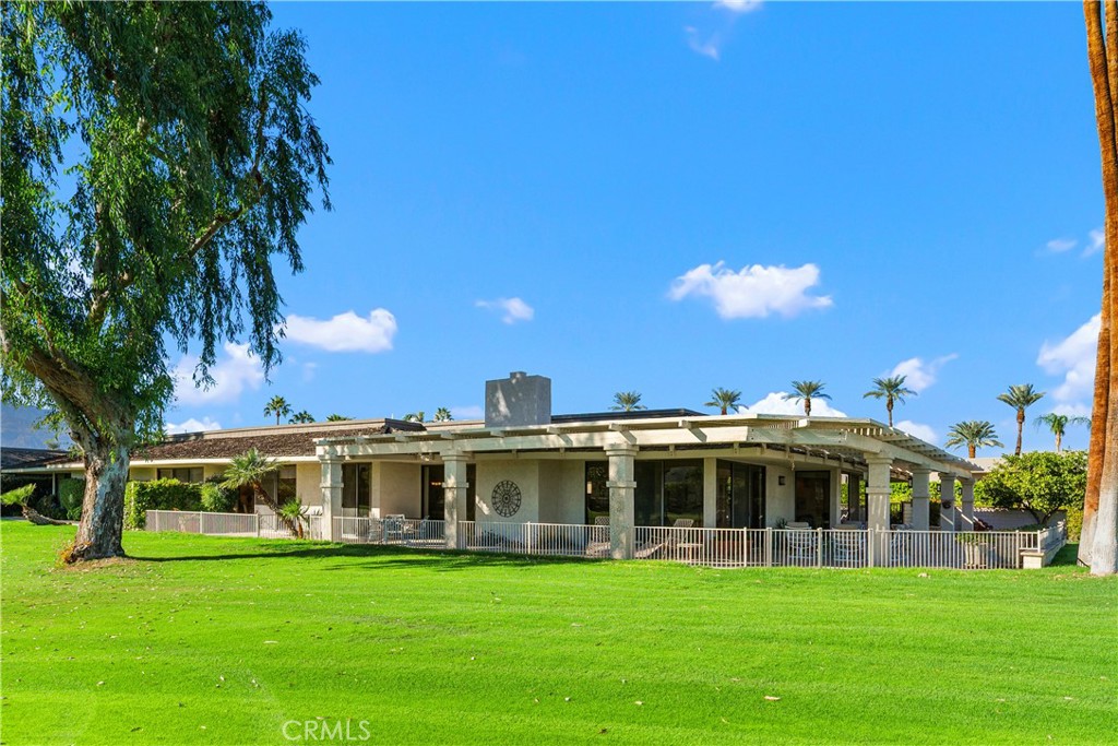 5 Princeton Drive Rancho Mirage, CA 92270 - Photo 25 of 27 a view of a big house with a big yard