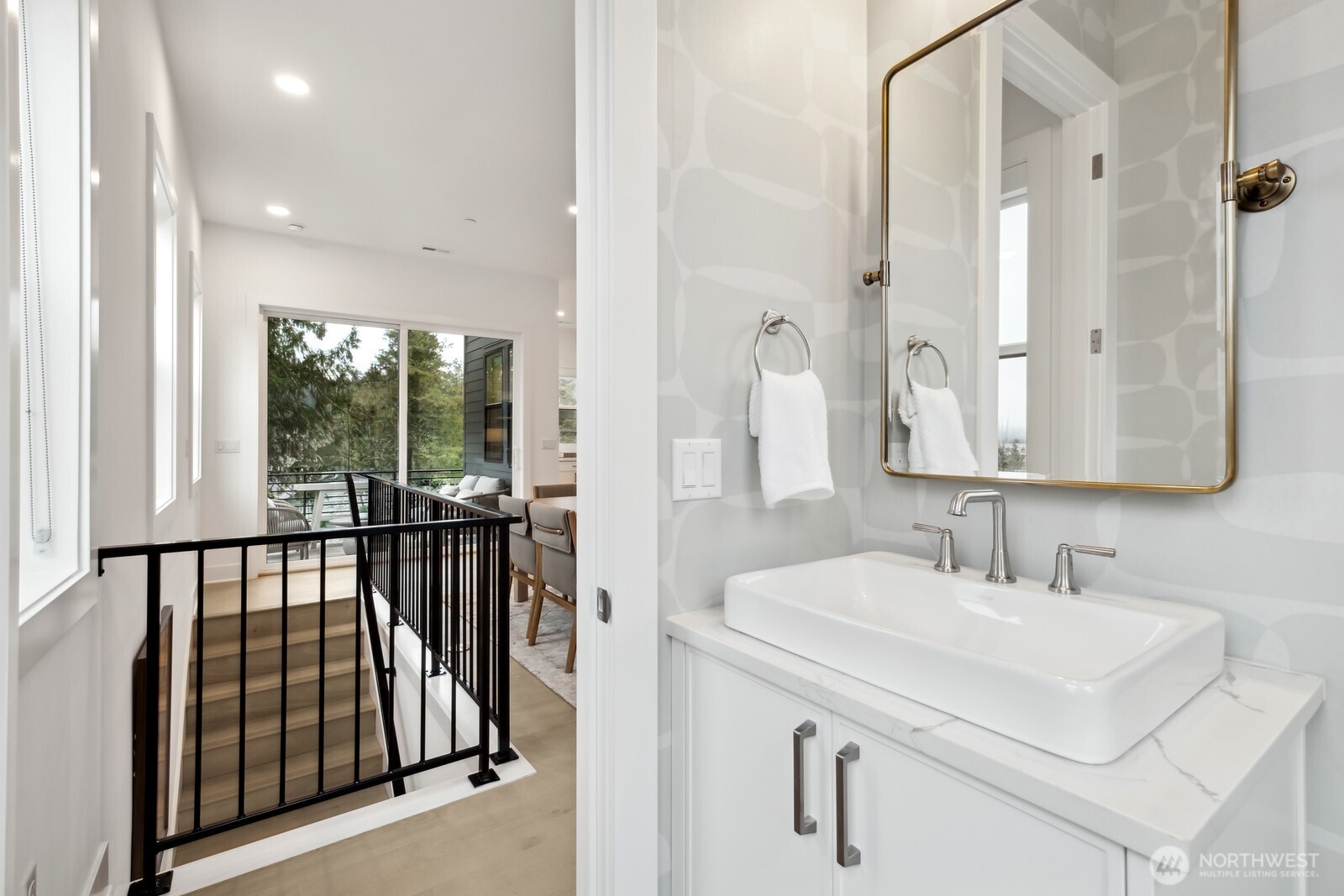 18923 99th Place Northeast, Unit A Bothell, WA 98011 - Photo 12 of 27 a en suite bathroom with a sink and mirror