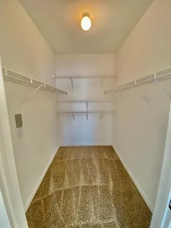 a view of a room with racks on the wall