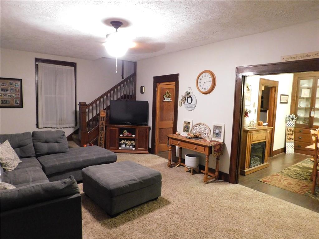 235 Ridge Road Brownsville, PA 15417 - Photo 16 of 42 a living room with furniture and a flat screen tv