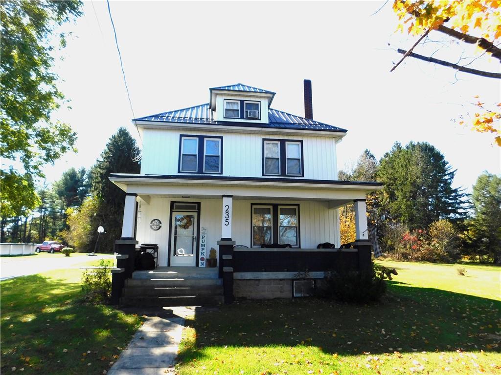 235 Ridge Road Brownsville, PA 15417 - Photo 3 of 42 a front view of a house with garden