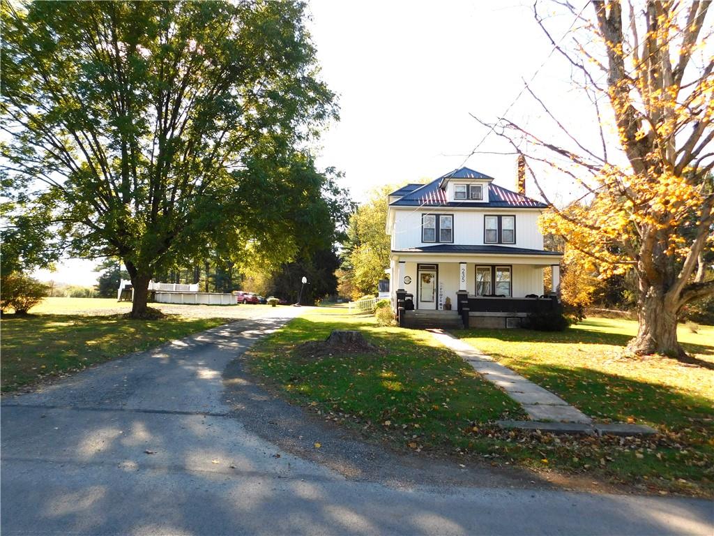 235 Ridge Road Brownsville, PA 15417 - Photo 4 of 42 a view of house with outdoor space and tree s