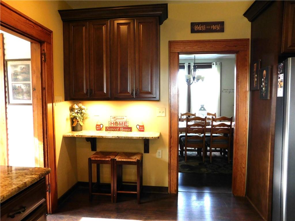 235 Ridge Road Brownsville, PA 15417 - Photo 8 of 42 a kitchen view with a table and chairs in it
