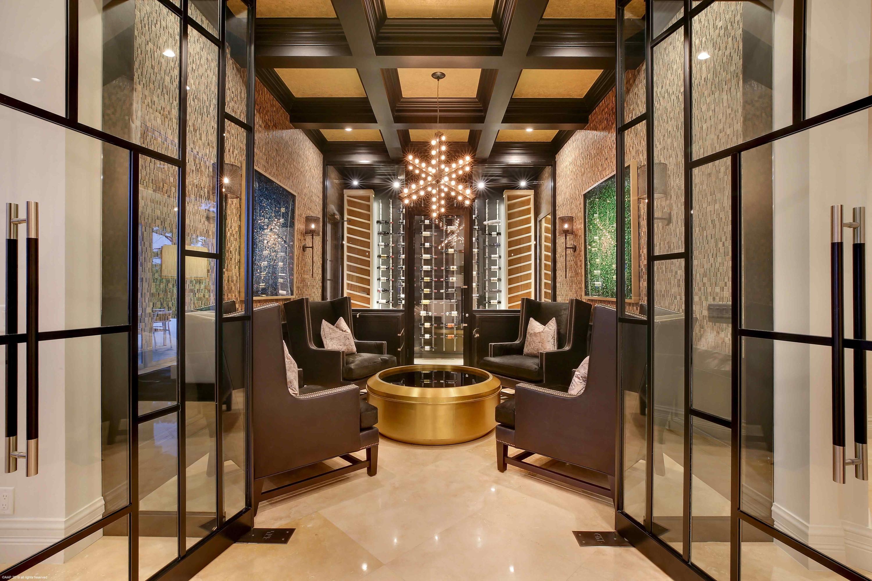 263 River Drive Tequesta, FL 33469 - Photo 17 of 68 a view of a dining room with furniture a chandelier and wooden floor