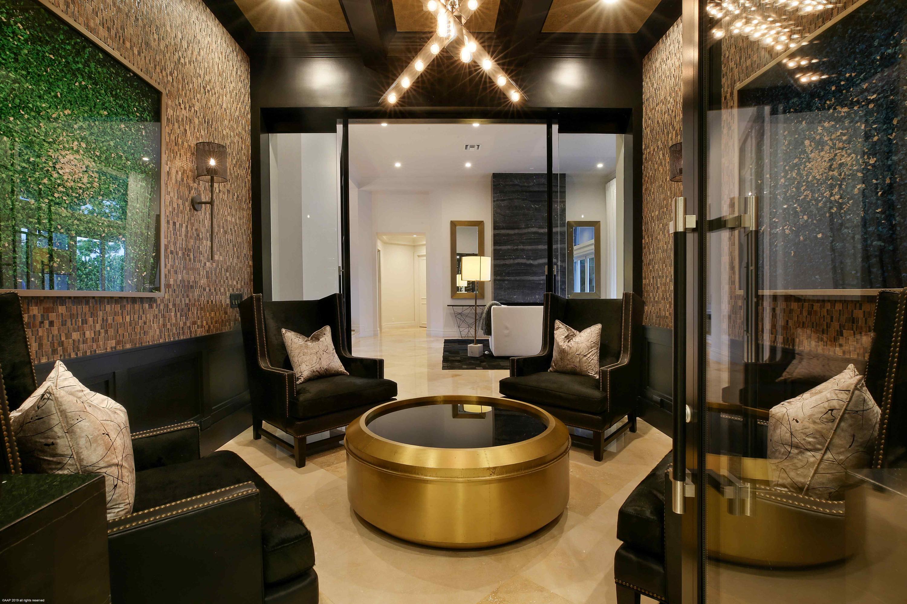 263 River Drive Tequesta, FL 33469 - Photo 18 of 68 a living room with furniture and a large window