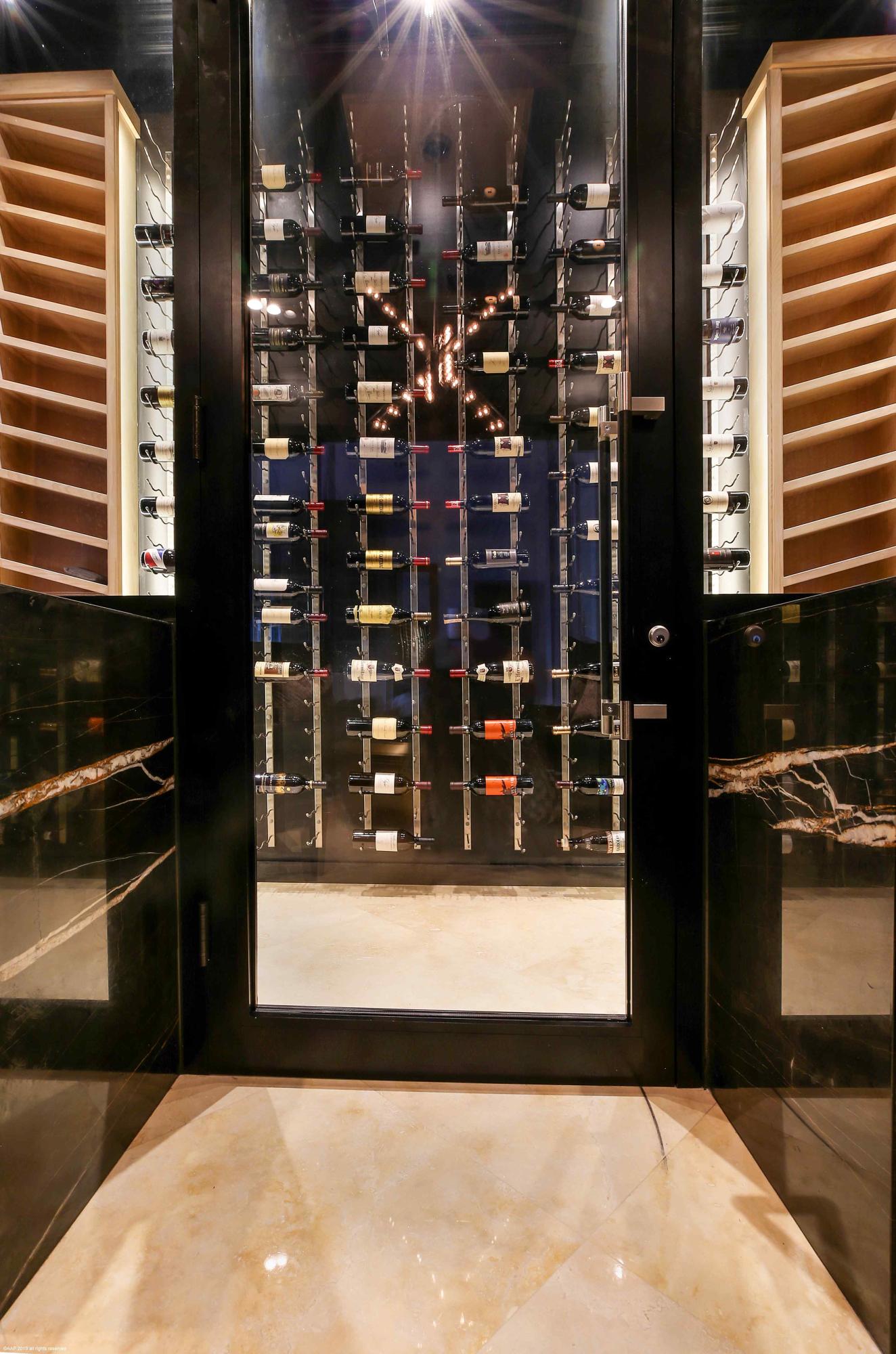 263 River Drive Tequesta, FL 33469 - Photo 19 of 68 Wine Room Entry