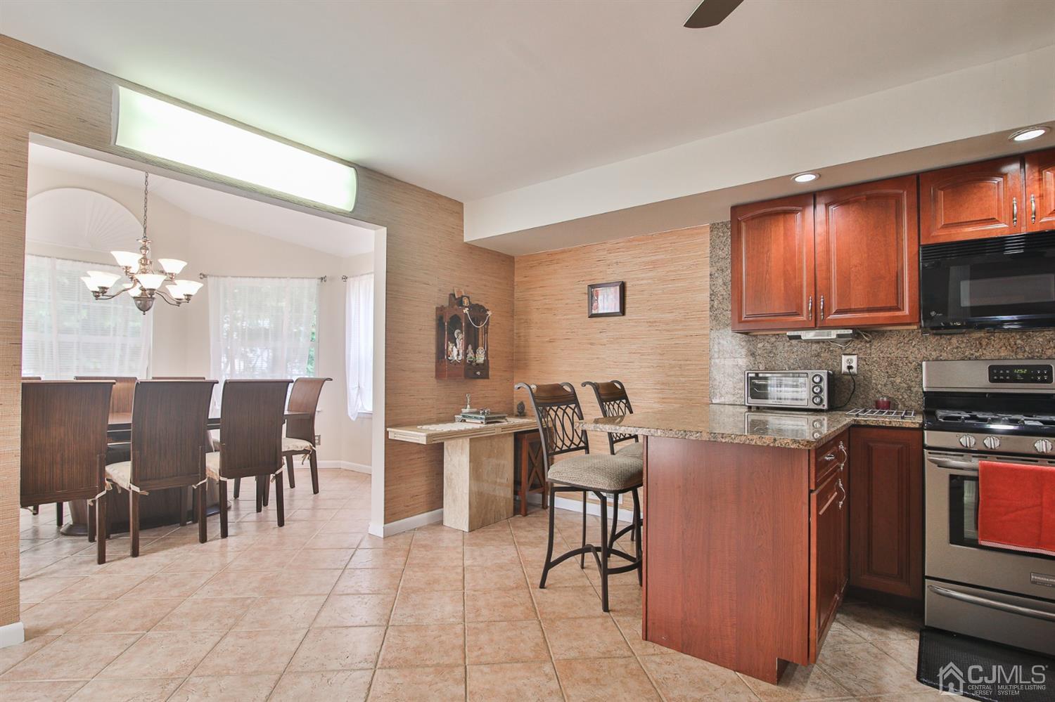 5 Avery Drive Old Bridge, NJ 08857 - Photo 14 of 32 a view of a dining room with furniture and a kitchen