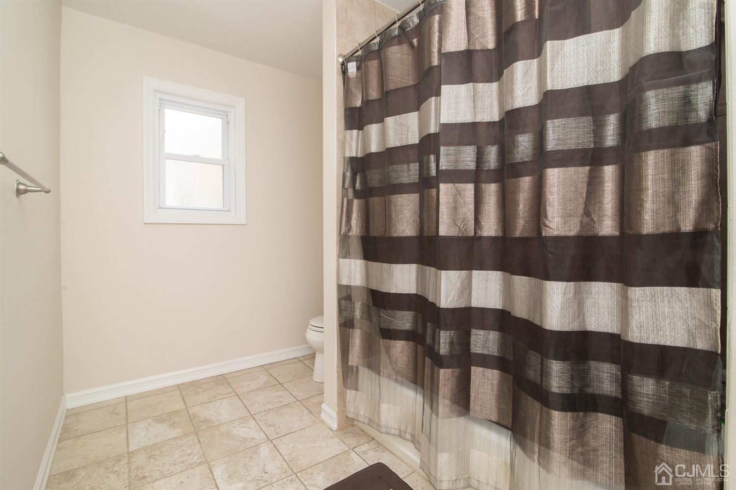 5 Avery Drive Old Bridge, NJ 08857 - Photo 19 of 32 a view of wooden floor in a bathroom