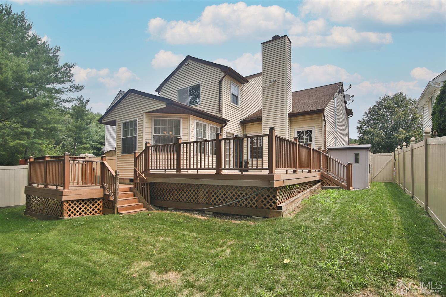 5 Avery Drive Old Bridge, NJ 08857 - Photo 3 of 32 a front view of a house with garden