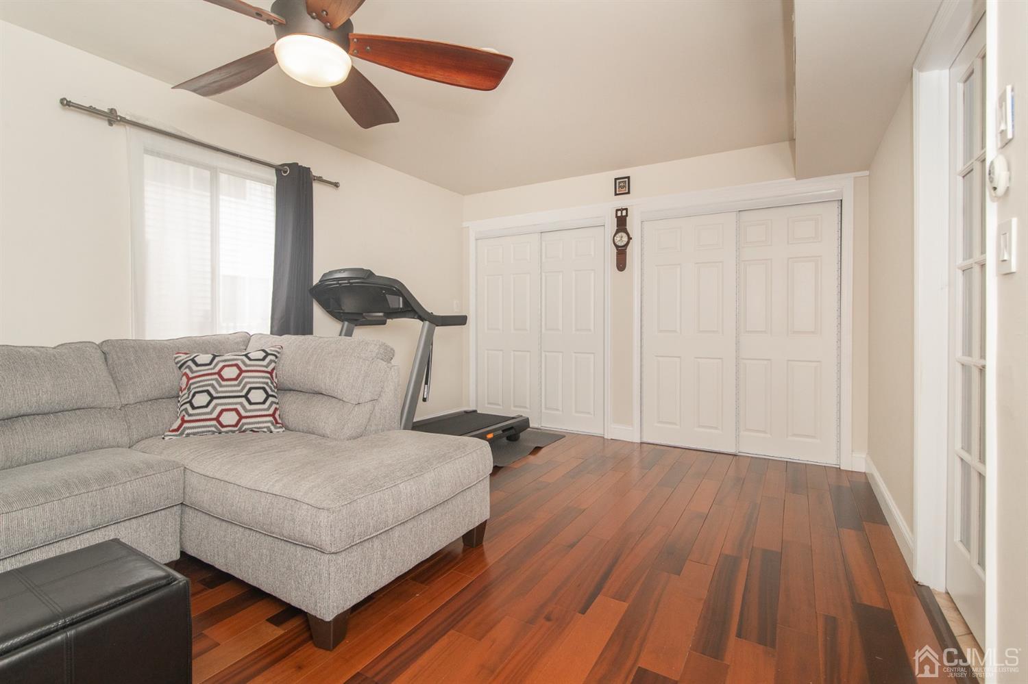 5 Avery Drive Old Bridge, NJ 08857 - Photo 29 of 32 a living room with furniture and a wooden floor