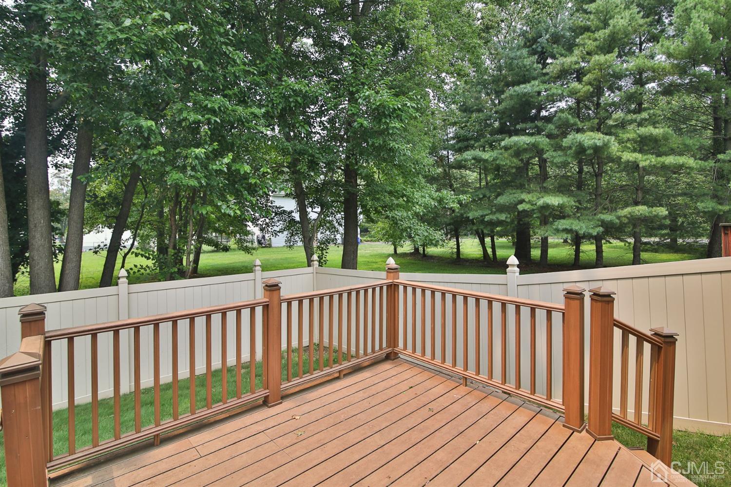5 Avery Drive Old Bridge, NJ 08857 - Photo 5 of 32 a view of deck with wooden floor and fence