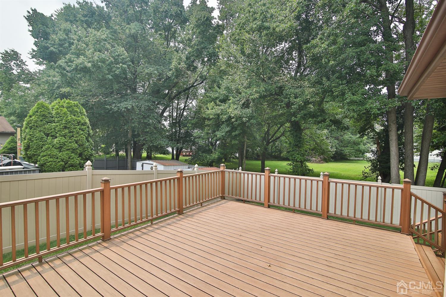 5 Avery Drive Old Bridge, NJ 08857 - Photo 7 of 32 a view of deck with wooden floor and fence