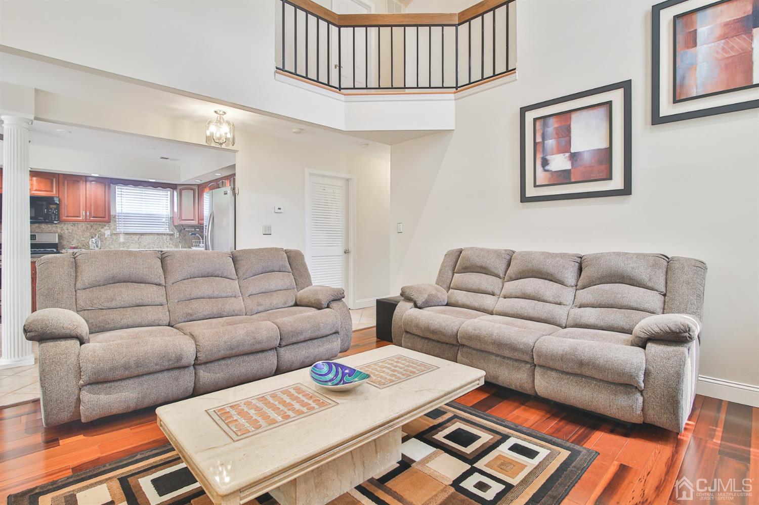 5 Avery Drive Old Bridge, NJ 08857 - Photo 8 of 32 a living room with furniture a rug and a window