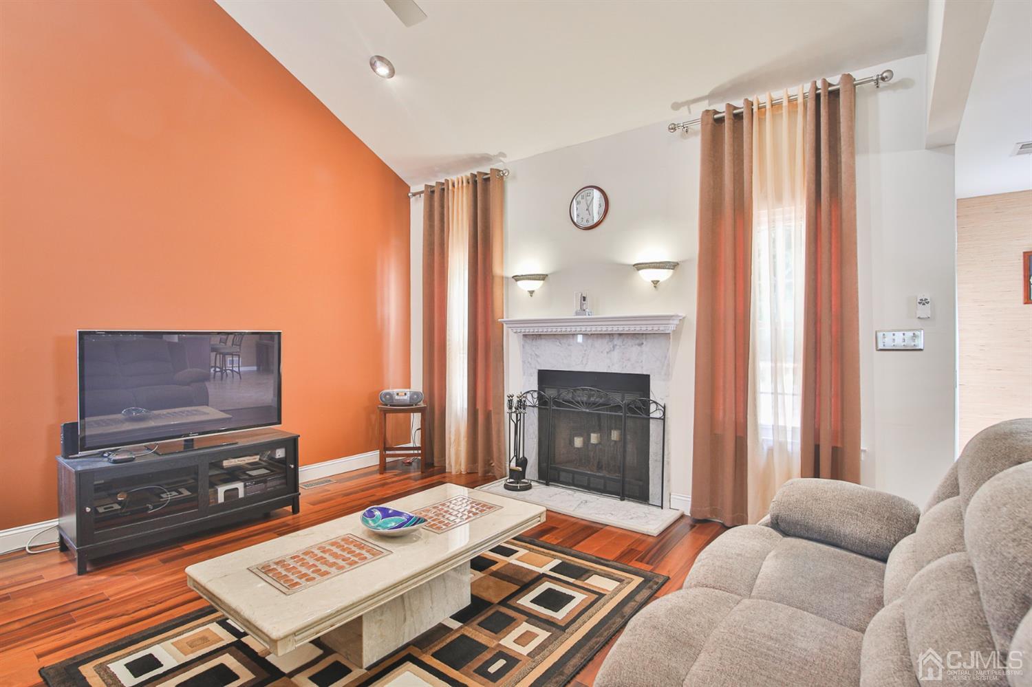 5 Avery Drive Old Bridge, NJ 08857 - Photo 9 of 32 a living room with furniture and a fireplace