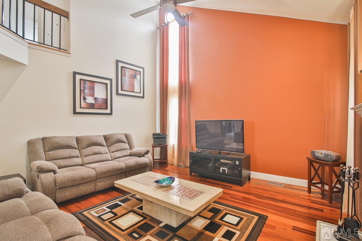 5 Avery Drive Old Bridge, NJ 08857 - Photo 10 of 32 a living room with furniture and a flat screen tv