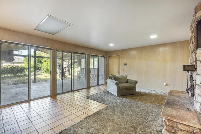 a view of an empty room and window