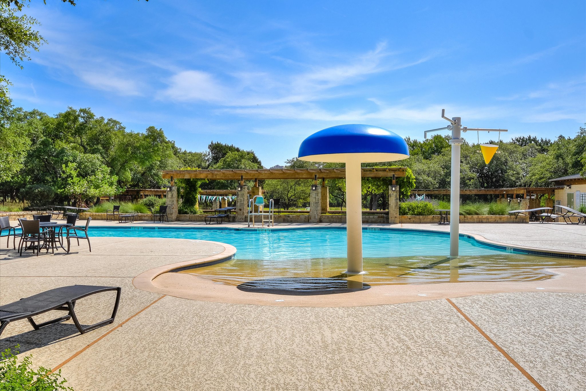 409 Harris Drive Austin, TX 78737 - Photo 22 of 29 a view of a swimming pool with a patio