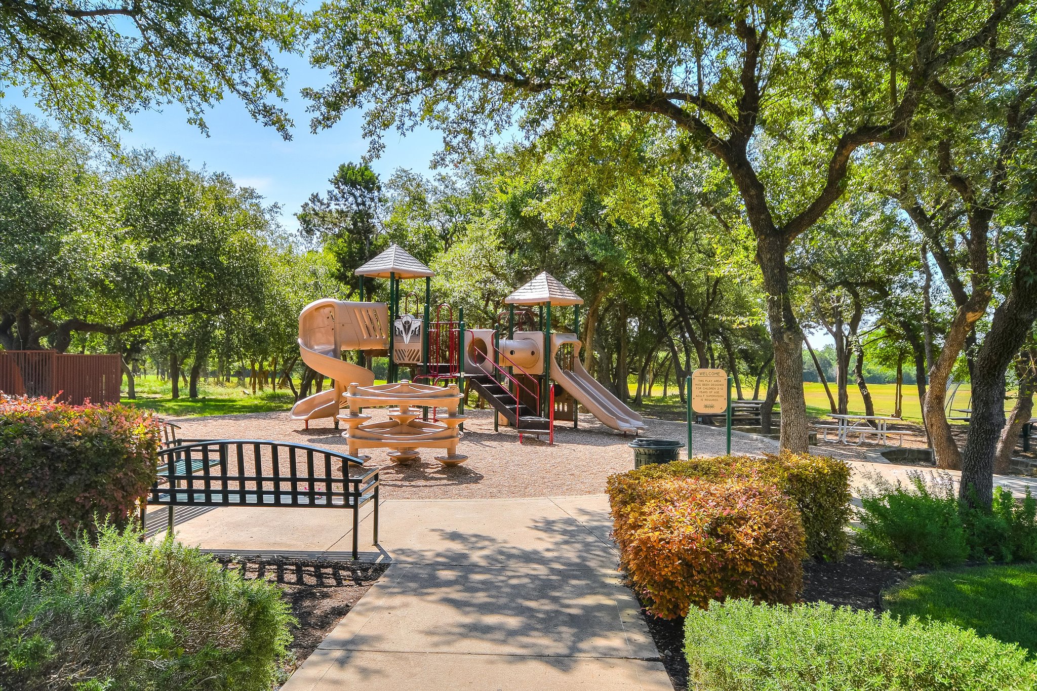 409 Harris Drive Austin, TX 78737 - Photo 24 of 29 a view of a deck with chairs and a yard