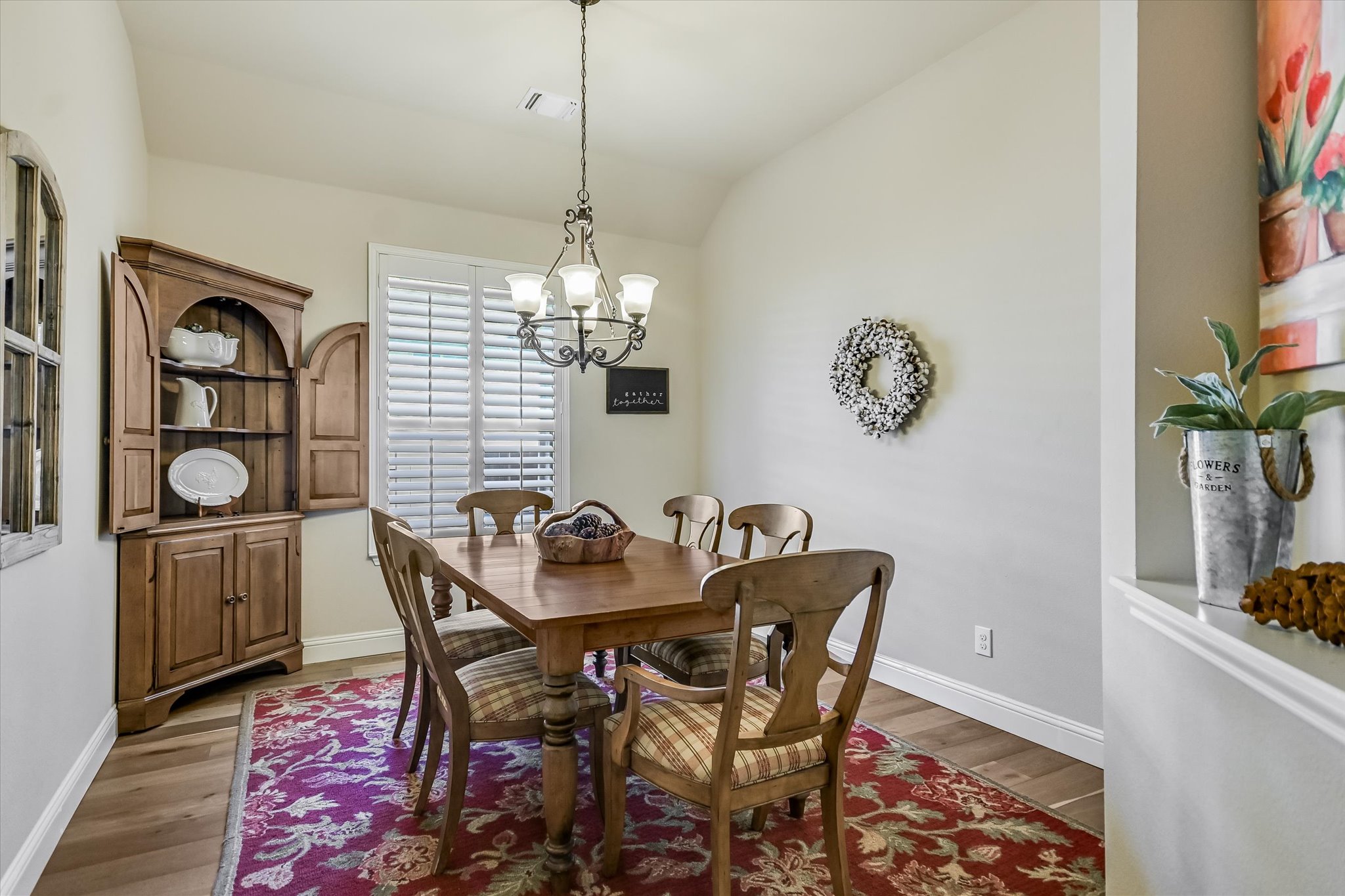 409 Harris Drive Austin, TX 78737 - Photo 6 of 29 a view of a dining room with furniture and chandelier