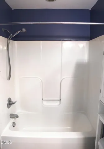 a view of a livingroom with a fan