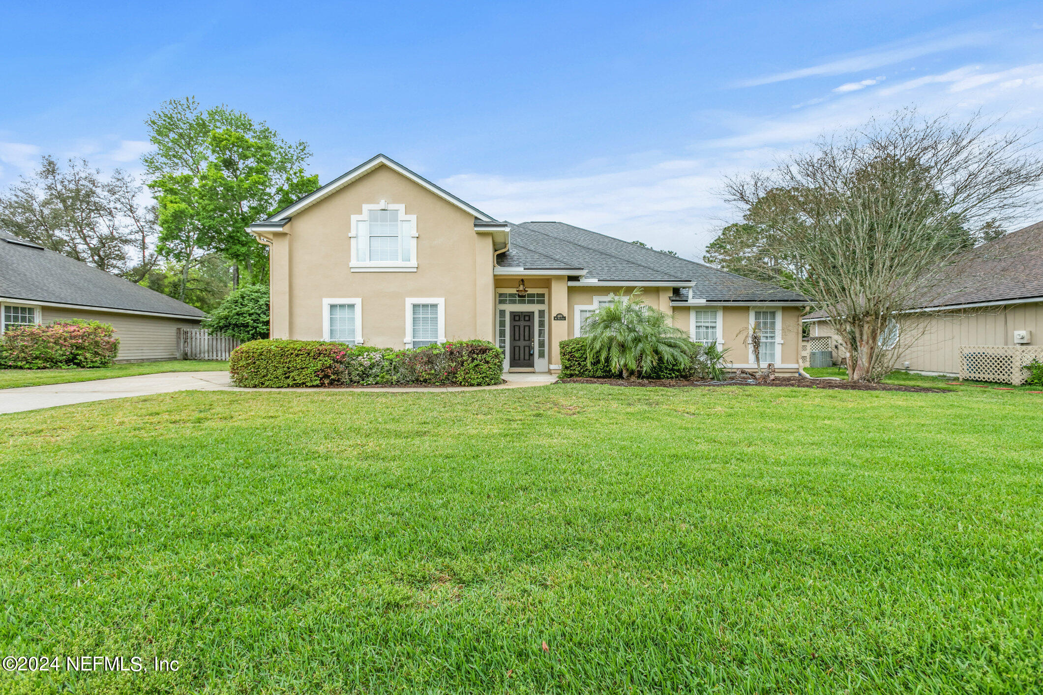 809 Mill Pond Court St. Johns, FL 32259 - Photo 2 of 50 a view of house that has a yard
