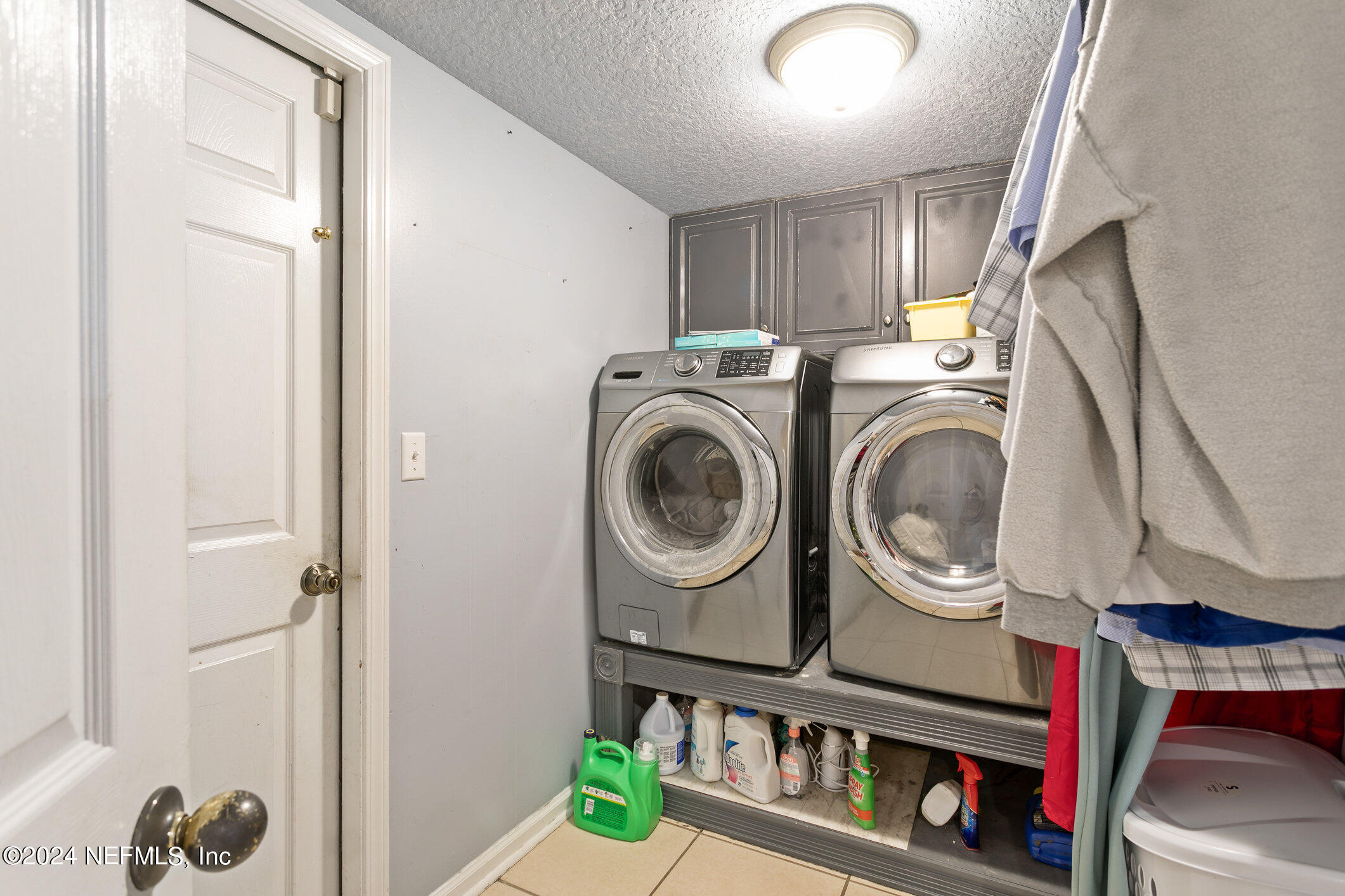 809 Mill Pond Court St. Johns, FL 32259 - Photo 28 of 50 a view of storage and utility room with washer and dryer