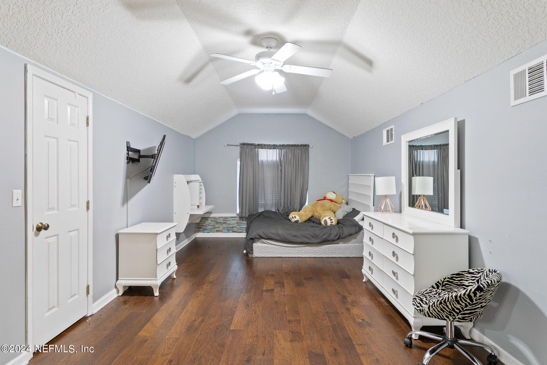 809 Mill Pond Court St. Johns, FL 32259 - Photo 29 of 50 a living room with furniture and a chandelier