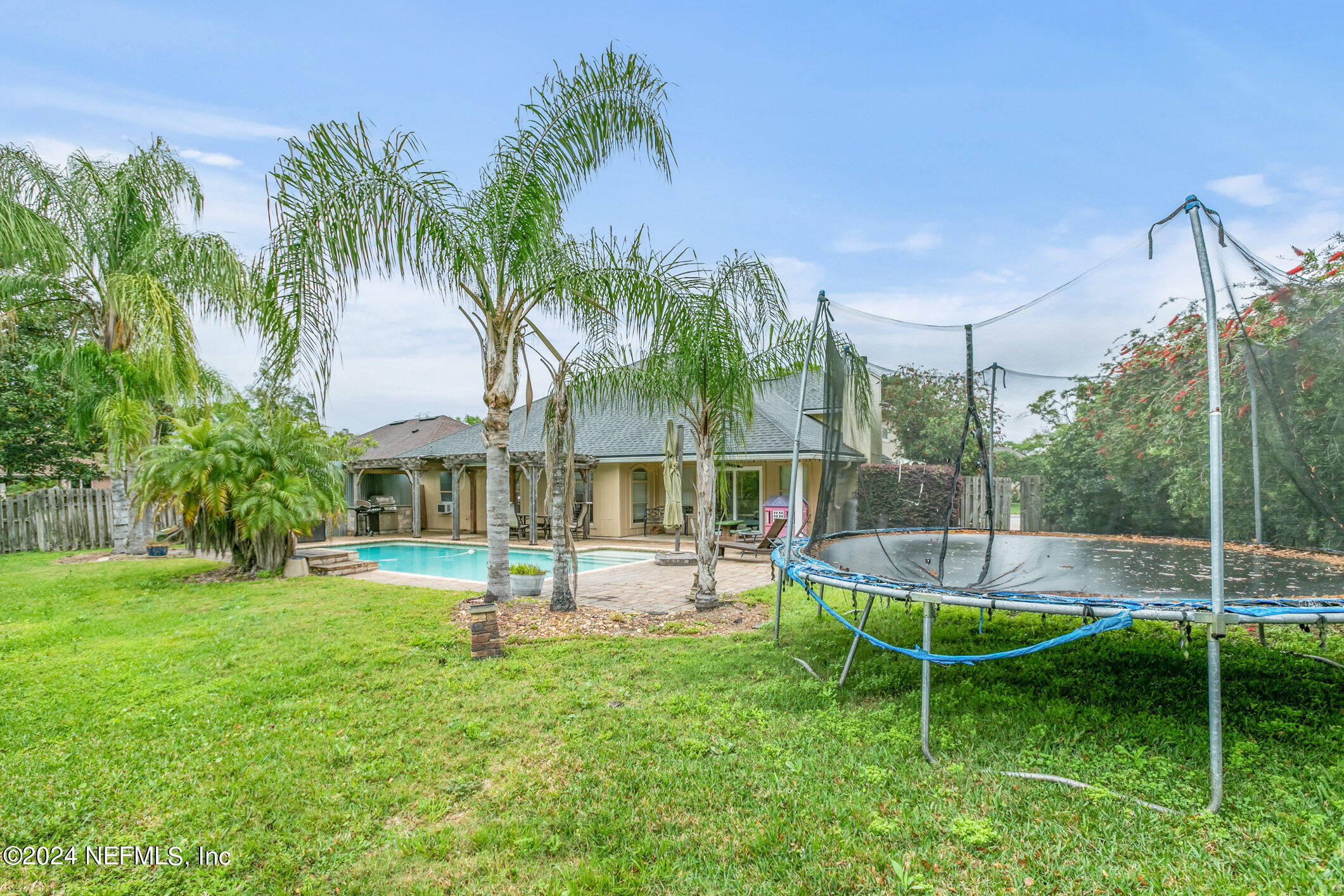 809 Mill Pond Court St. Johns, FL 32259 - Photo 37 of 50 a view of a house with a yard and sitting area