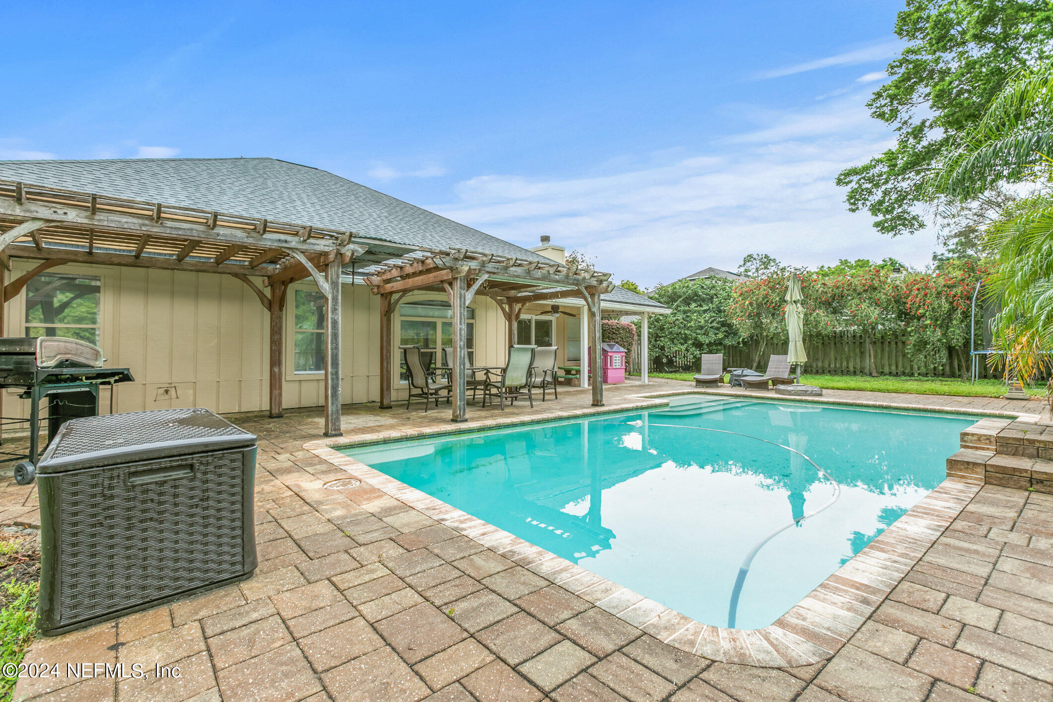 809 Mill Pond Court St. Johns, FL 32259 - Photo 38 of 50 a view of a house with swimming pool and sitting area