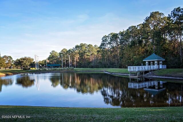 809 Mill Pond Court St. Johns, FL 32259 - Photo 42 of 50 a view of a lake with houses in the background