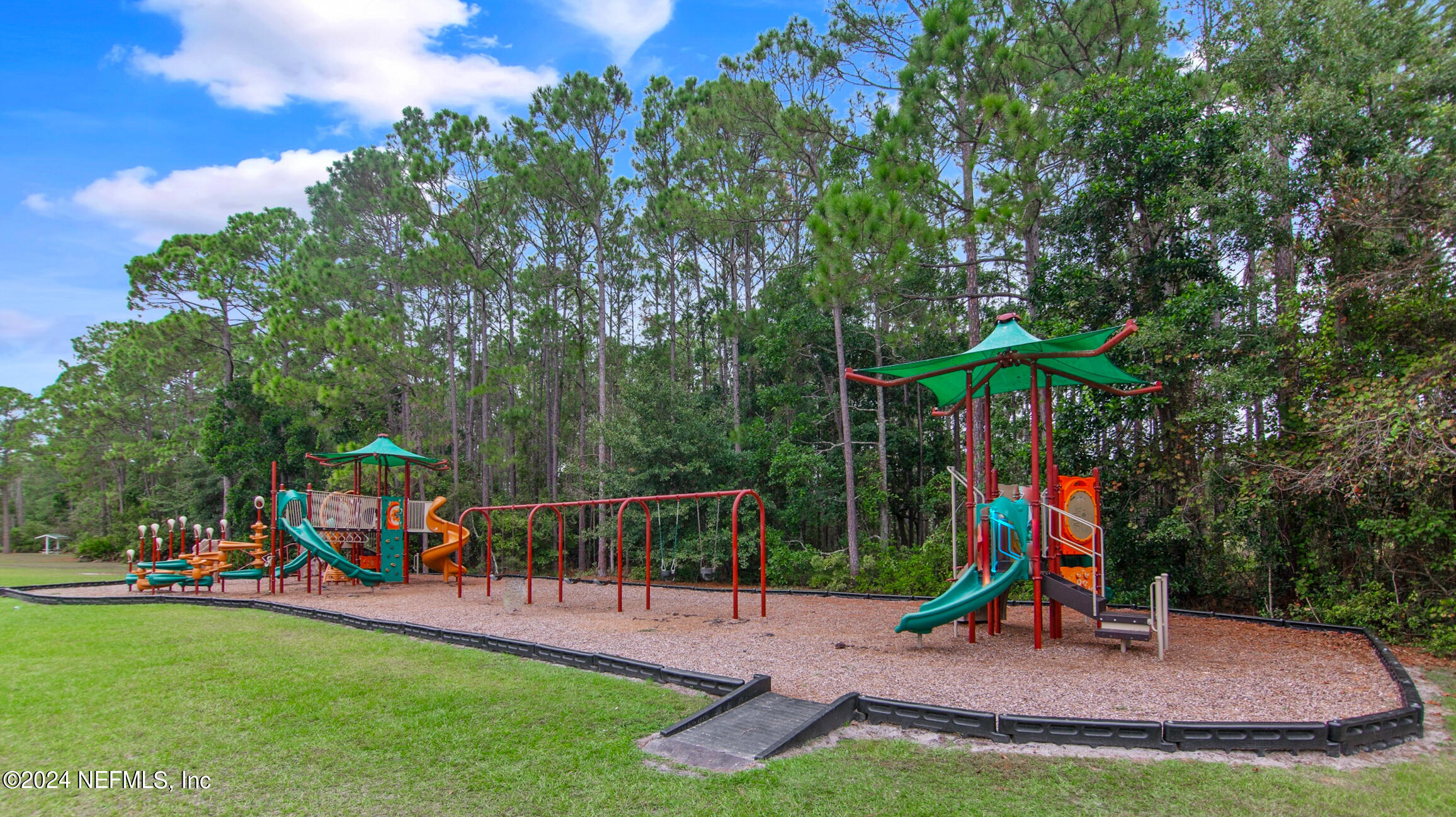 809 Mill Pond Court St. Johns, FL 32259 - Photo 46 of 50 a view of outdoor space with a swimming pool