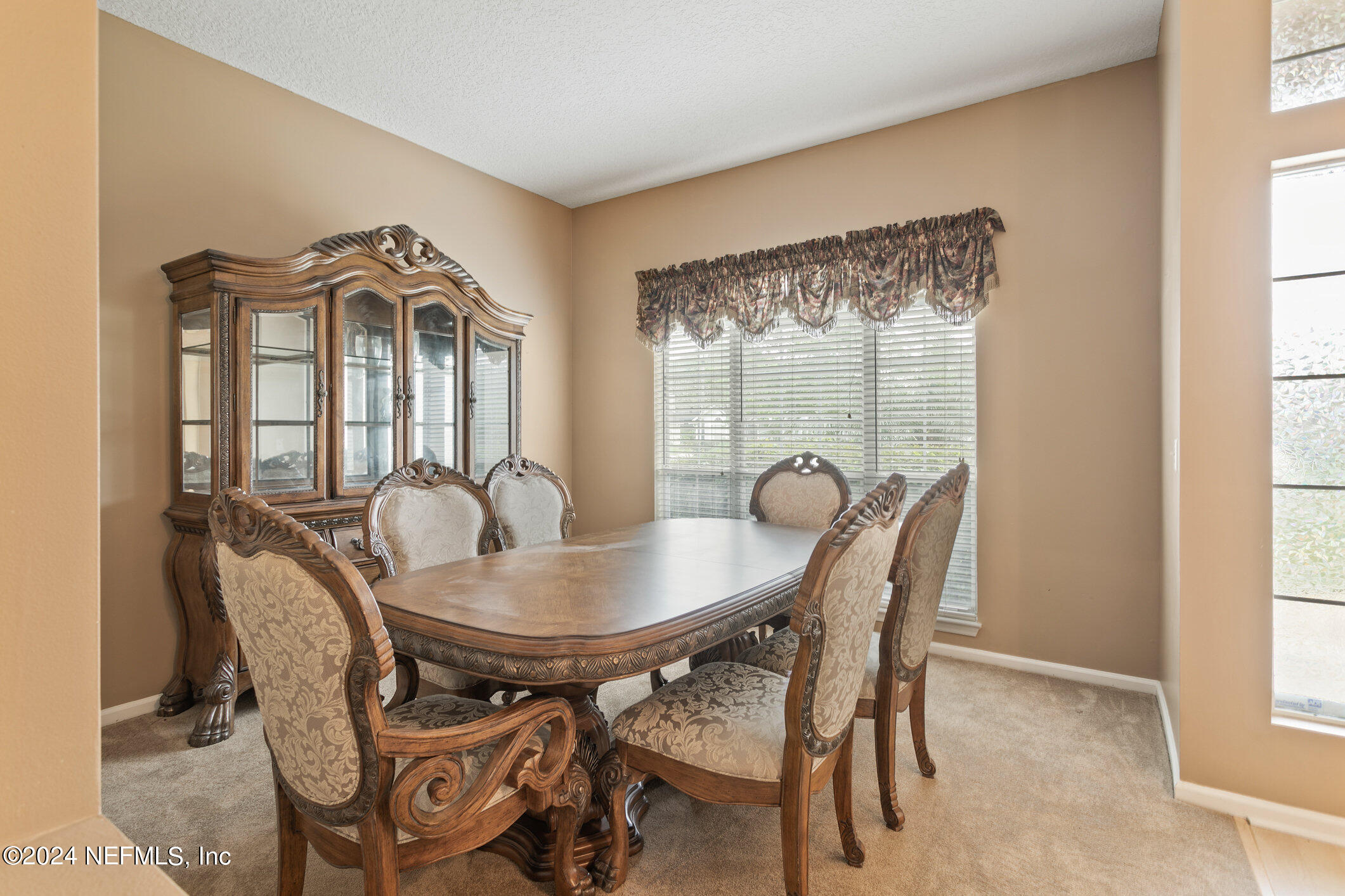 809 Mill Pond Court St. Johns, FL 32259 - Photo 5 of 50 a view of a dining room with furniture window and outside view
