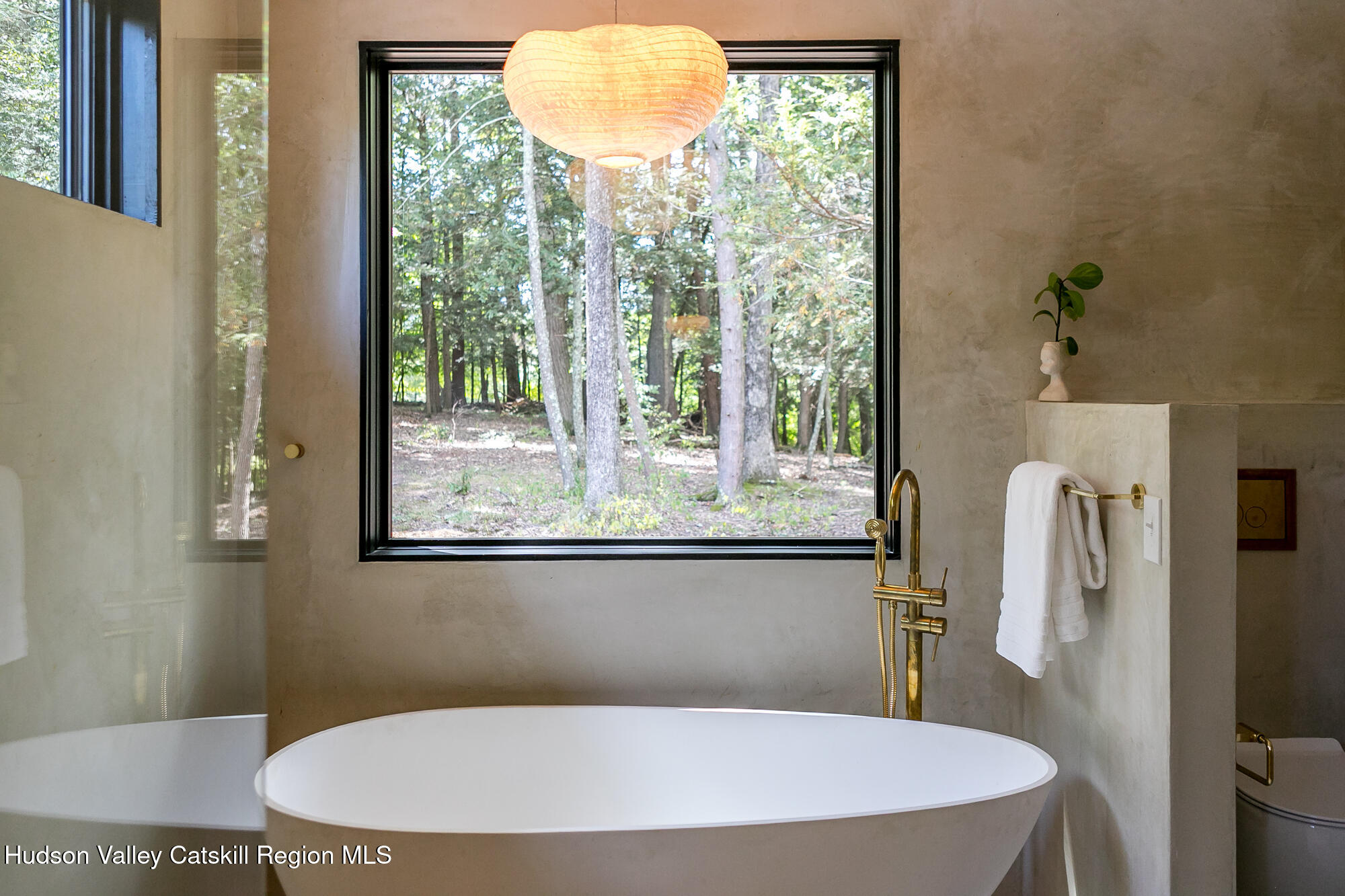 35 Fern Hollow Road Stone Ridge, NY 12484 - Photo 26 of 40 a bathroom with a toilet a sink and a mirror