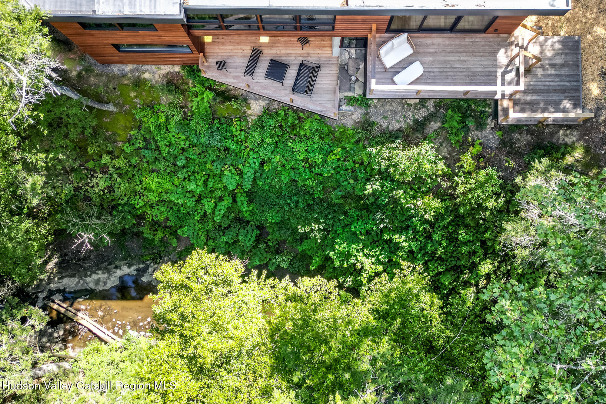 35 Fern Hollow Road Stone Ridge, NY 12484 - Photo 4 of 40 an aerial view of a house with a yard and garden