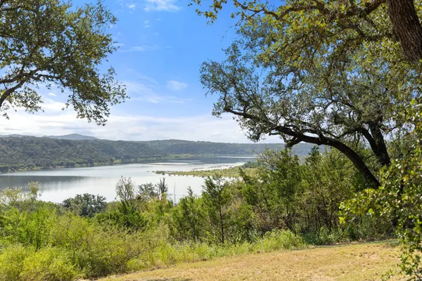 a view of a lake with an outdoor space
