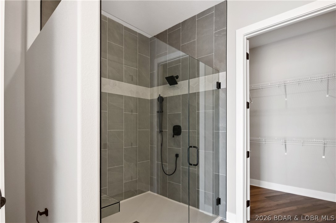 1184 Jeffries Road, Unit 218 Osage Beach, MO 65065 - Photo 11 of 46 Both the primary and guest ensuite have beautiful