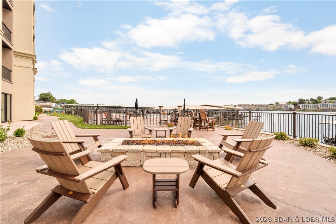 1184 Jeffries Road, Unit 218 Osage Beach, MO 65065 - Photo 4 of 46 Lakeside firepit.