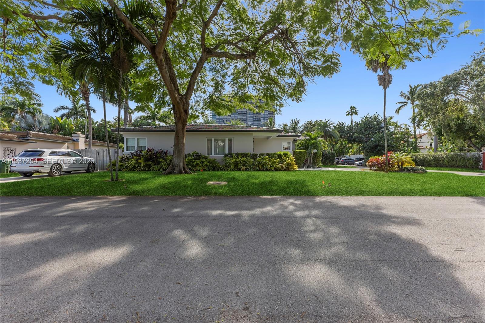 800 Northeast 72nd Street Miami, FL 33138 - Photo 40 of 48 a view of a house with a yard