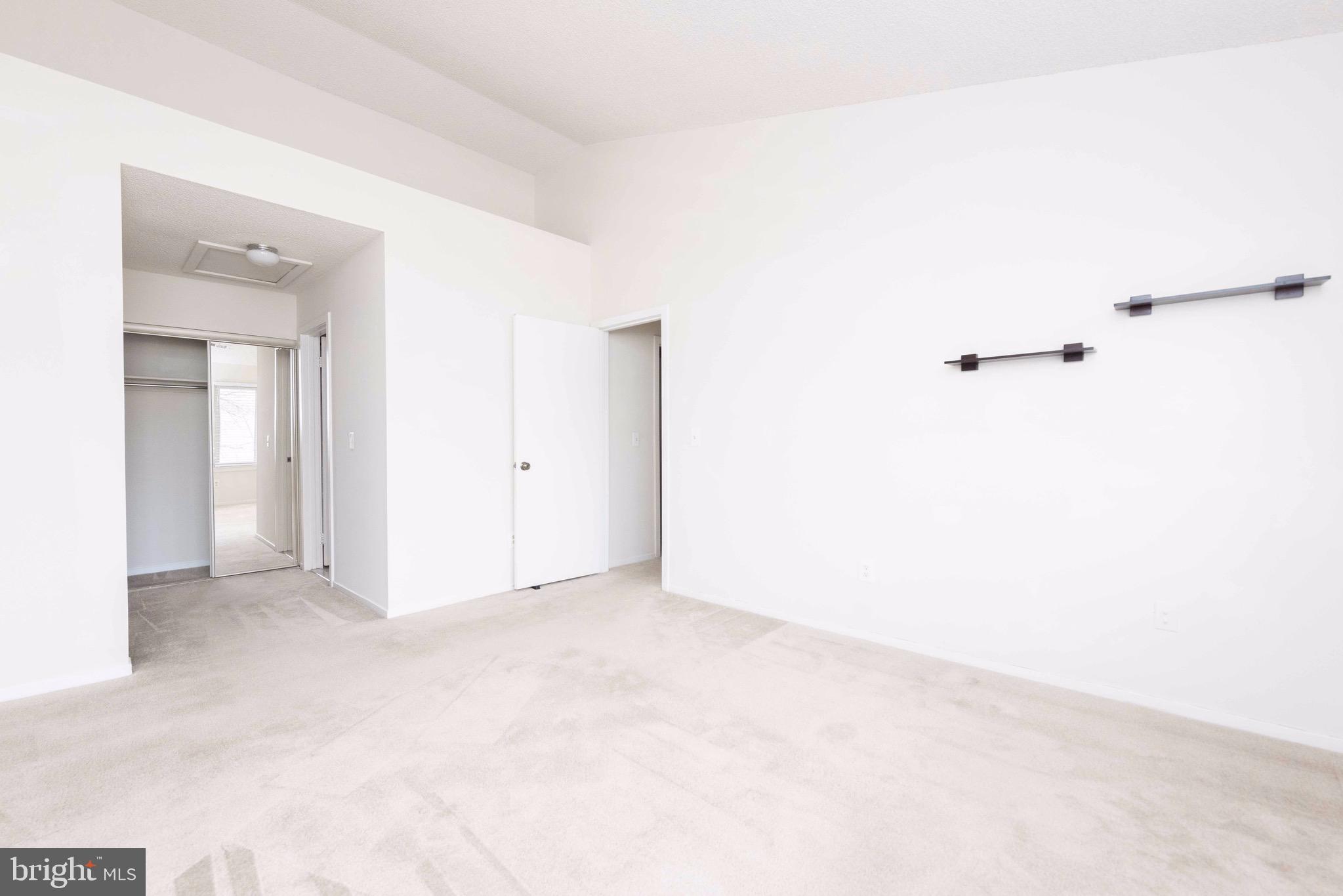 11708 Summerchase Circle, Unit 1708E Reston, VA 20194 - Photo 8 of 17 a view of an empty room