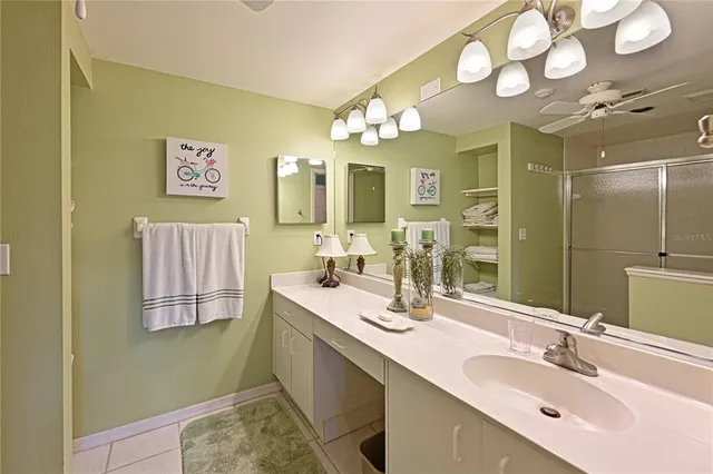 a bathroom with a sink double vanity and a mirror
