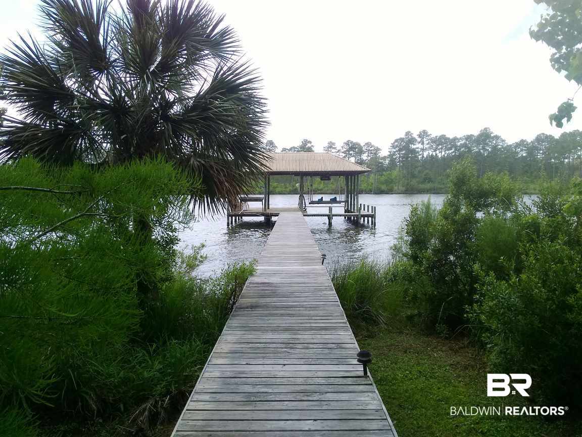 8132 Bay View Drive Foley, AL 36535 - Photo 39 of 50 To pier & boathouse