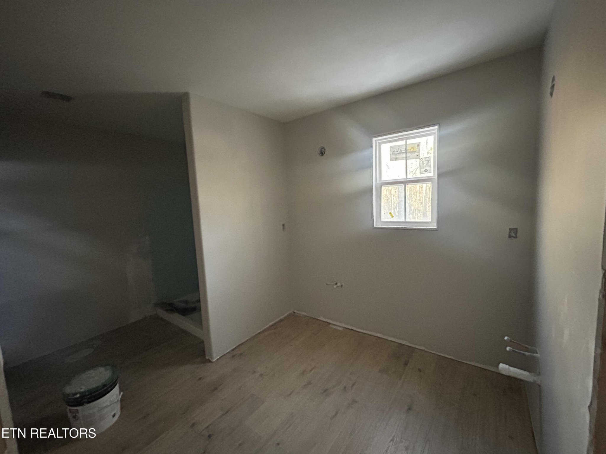 59 C C C Road Monterey, TN 38574 - Photo 11 of 13 an empty room with a window