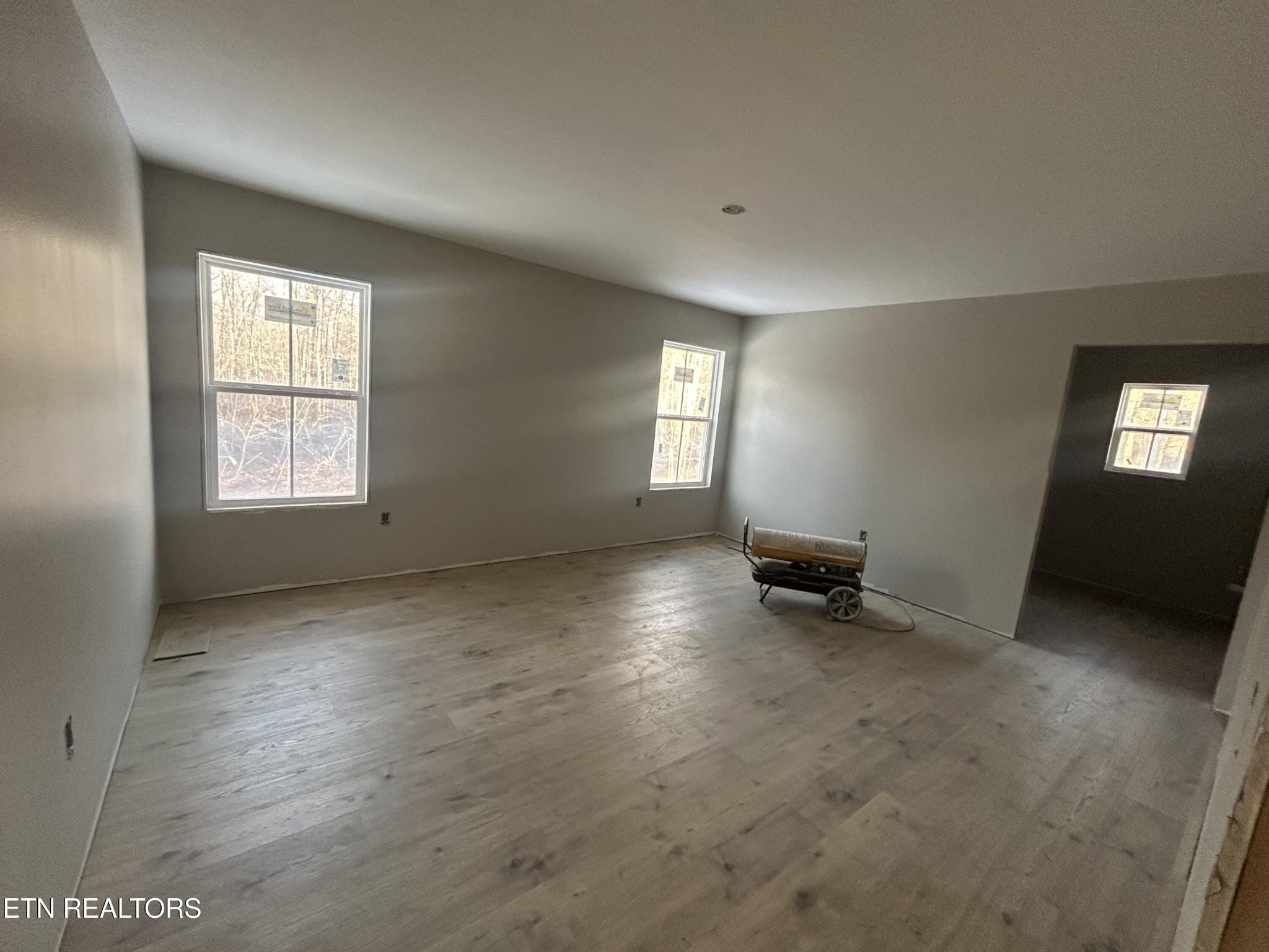 59 C C C Road Monterey, TN 38574 - Photo 10 of 13 an empty room with windows