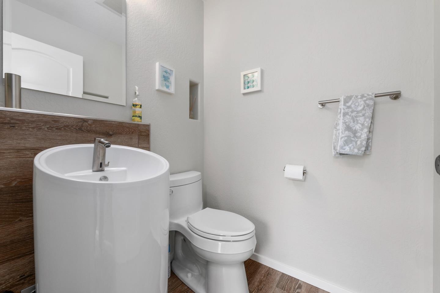 2455 Fairview Lane Santa Clara, CA 95051 - Photo 12 of 25 a bathroom with a toilet sink and mirror