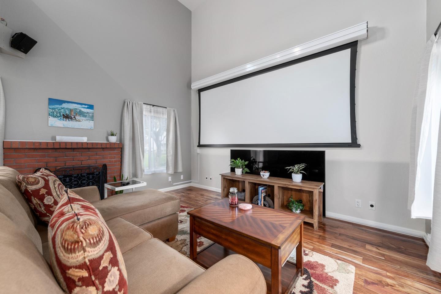 2455 Fairview Lane Santa Clara, CA 95051 - Photo 5 of 25 a living room with furniture and a fireplace